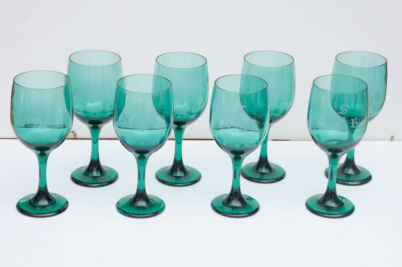 Just in time to brighten the Christmas table. Eight (8) green wine glasses. 