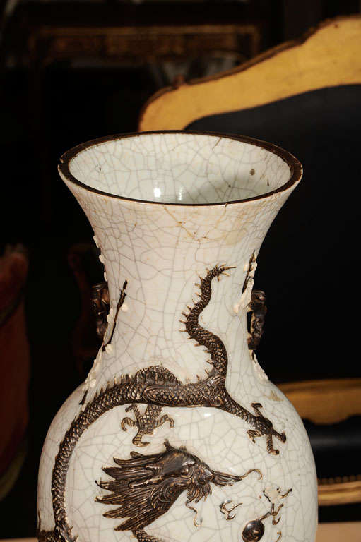 Ceramic brown and off-white oriental vessels.