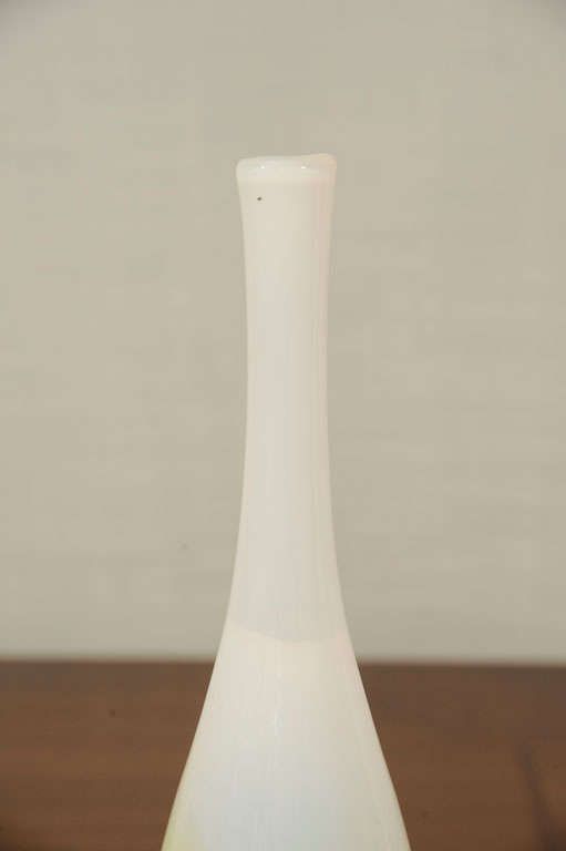 Blown glass vase in white and yellow designed by Floris Meydam for Leerdam. Signed with original sticker.