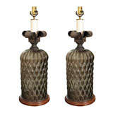 Pair of French raised glass metal lamps