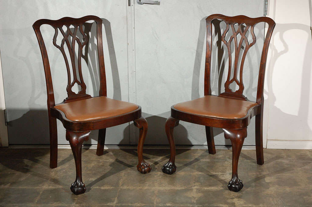 This set of six ribbon backed, claw and ball Chippendale style chairs, are probably English, circa 1890's. They are of generous proportion and would look nice in a period setting. 