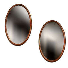 Pair of Mahogany Oval Mirrors