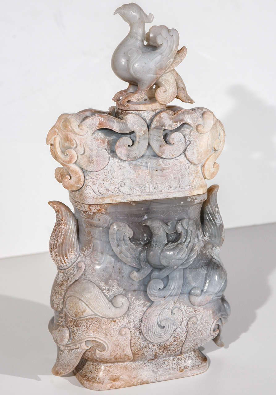 Republic Period, lidded, jade urn with Phoenix and demon reliefs.