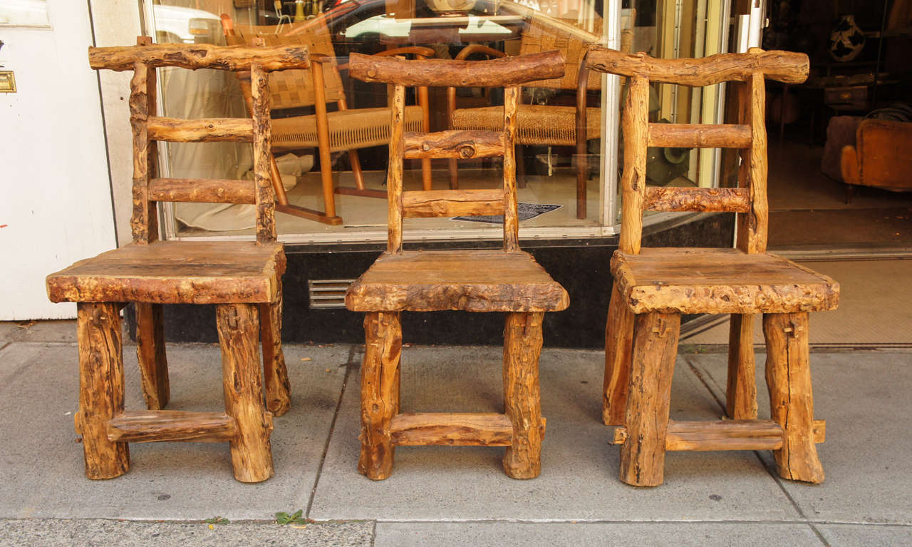 Six Rustic American Craft Chairs, the chairs made from separate logs and sections of tree