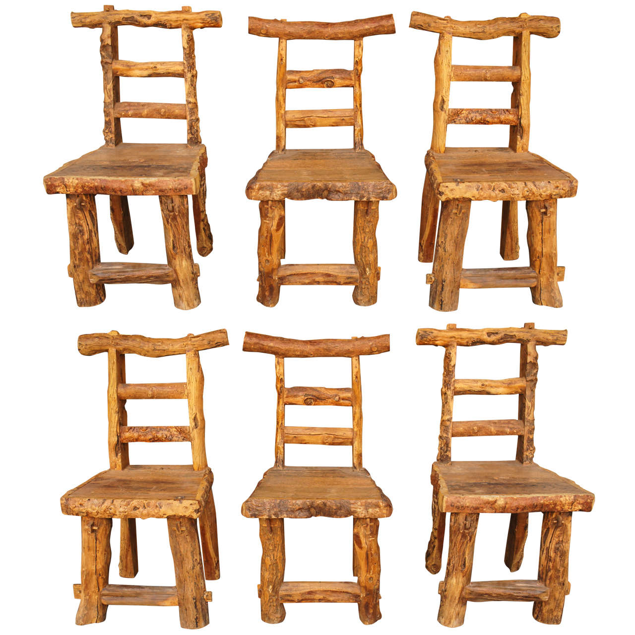 A Set of Large Scale Rustic Chairs