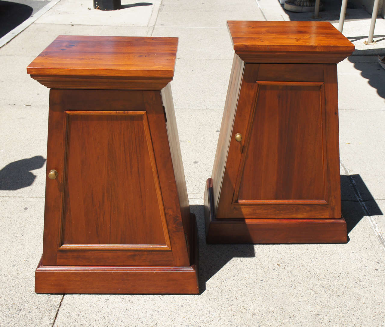 This usual and lovely pair of vintage stands might be used as end tables or night stands. They were made in the last twenty years and most likely are from an Anglo Indian source. Made of an indigenous hard wood and pine  the stands have little to no
