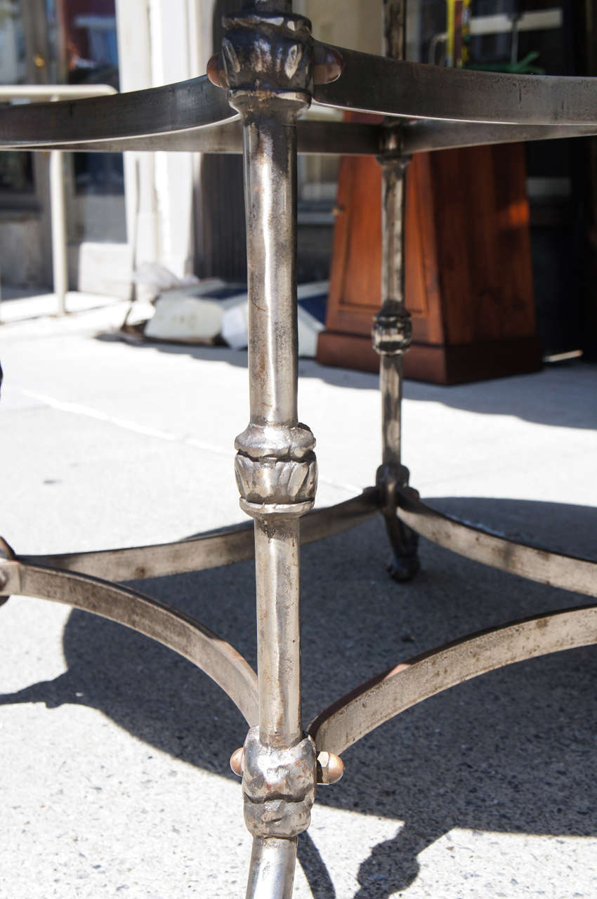 A Late 19th Century Polished Steel Marble Topped Center Table 1