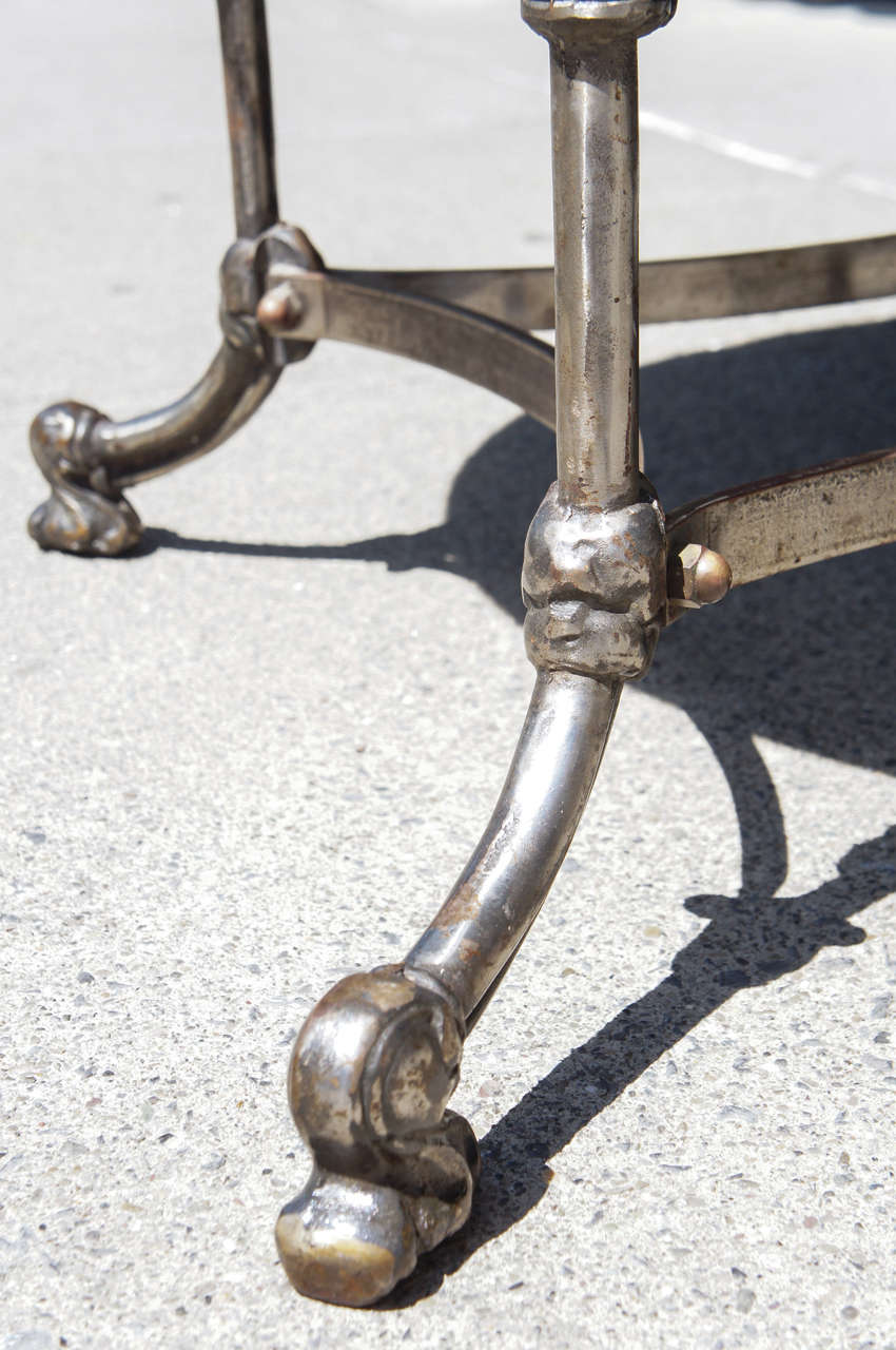 A Late 19th Century Polished Steel Marble Topped Center Table 2
