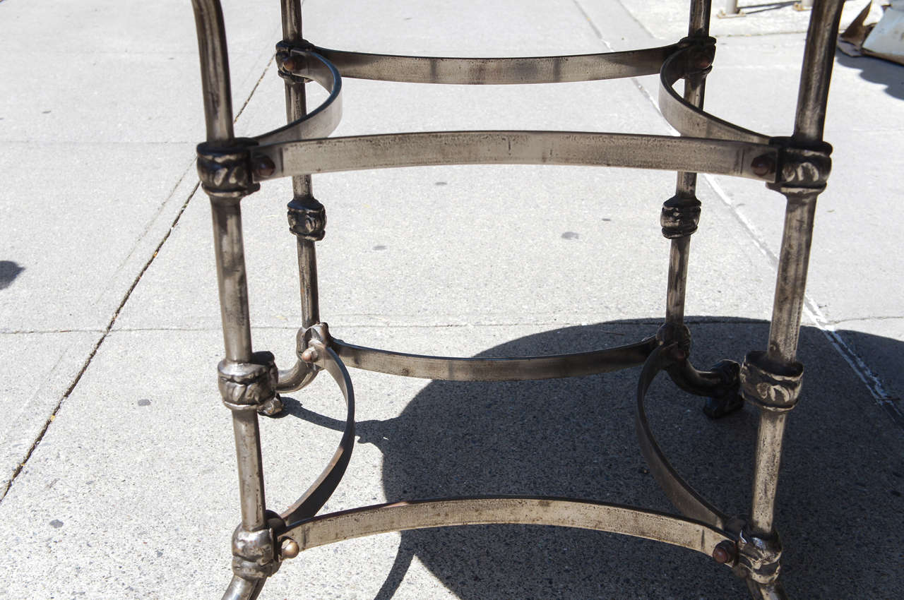 A Late 19th Century Polished Steel Marble Topped Center Table 3