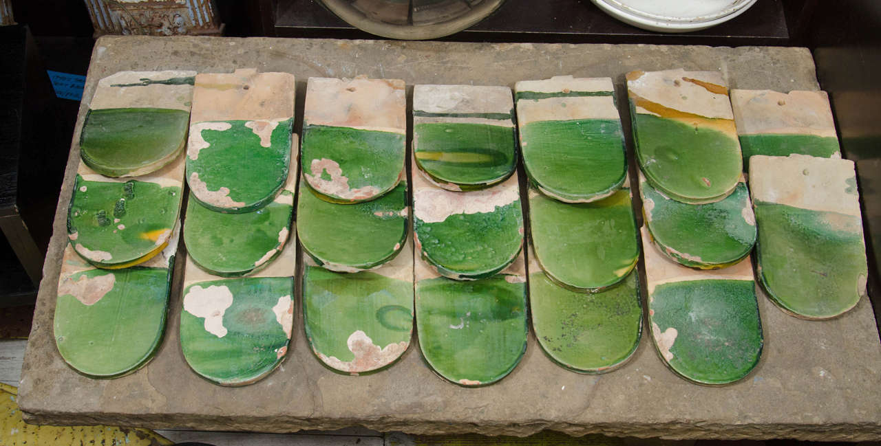 Set of 20 French roof tiles with green glaze. Lovely on garden path or for display in a kitchen.