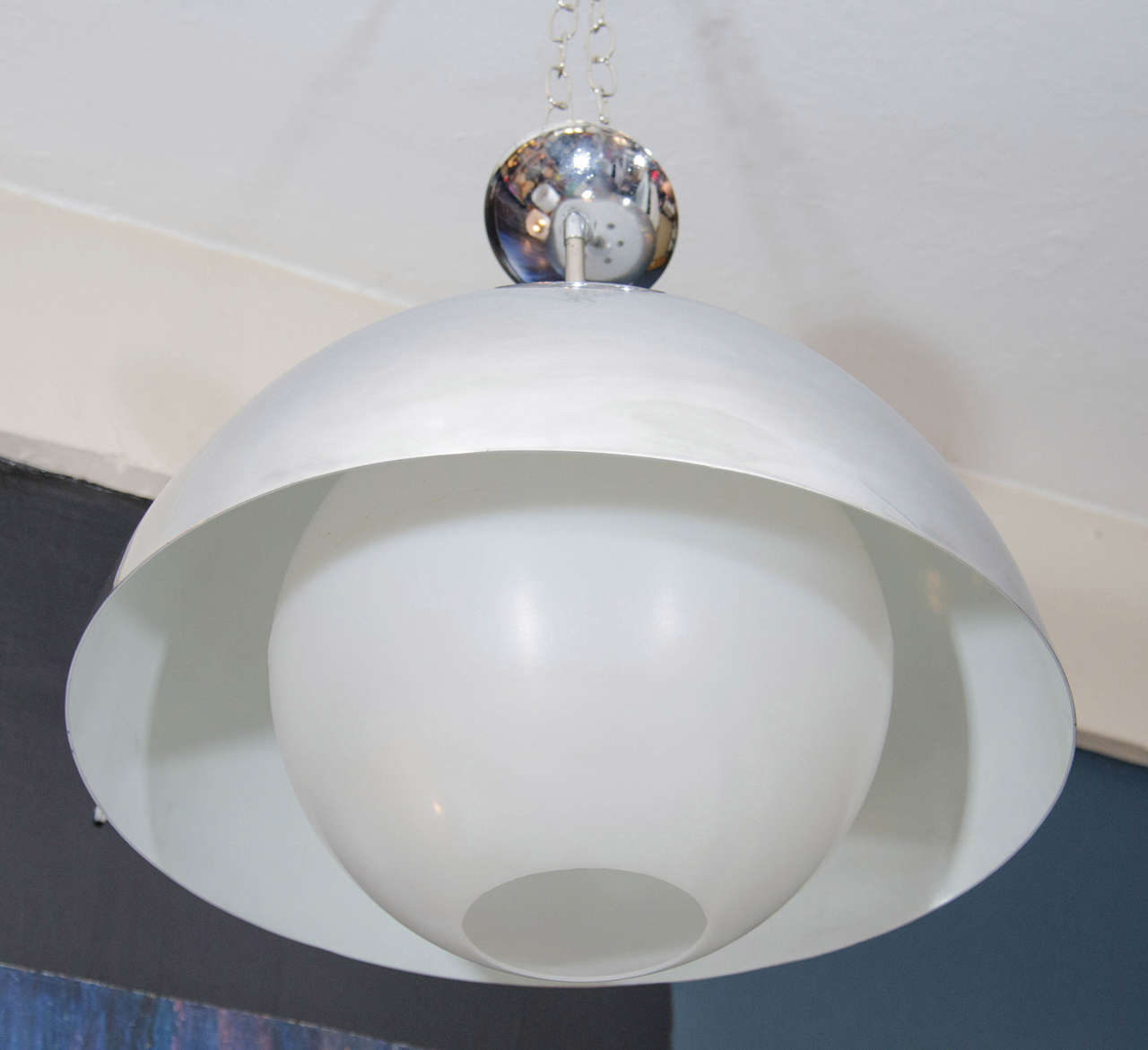 A vintage aluminum dome pendant light by Paul Mayen.

Good vintage condition with age appropriate wear.