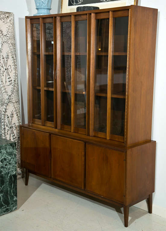 Rare Danish modern teak breakfront or sideboard in the Keegan style.