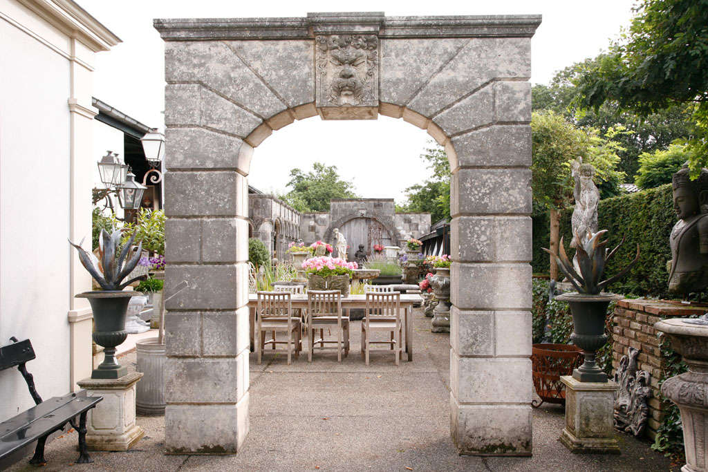 20th Century A carved limestone arch
