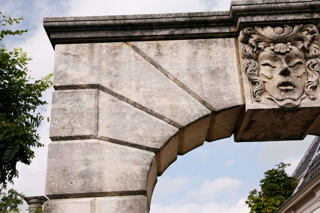 A carved limestone arch 1
