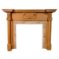 A 19th C. French carved pine fireplace / mantel piece in Neoclassical style