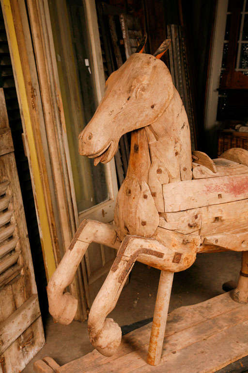 Wood A 19th Century Continental carved wood fairground horse