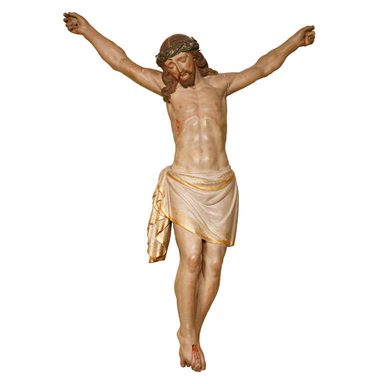 A large 20th century carved and polychrome painted wooden figure of