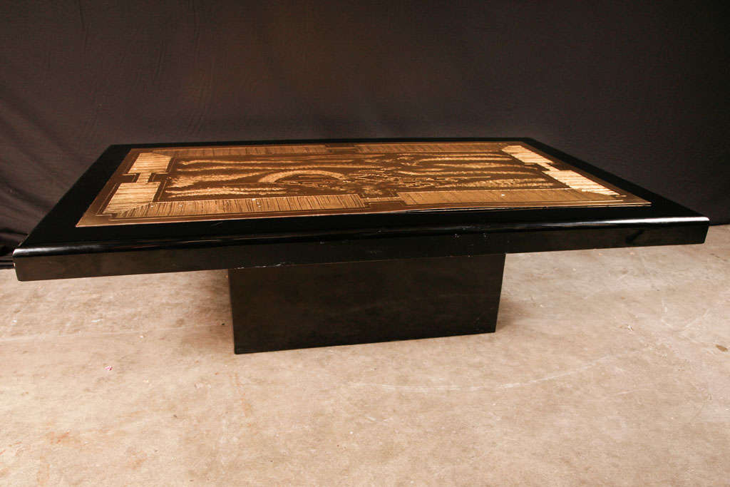 Beautiful rectangular coffee table with an etched brass artwork signed by Lova Creations