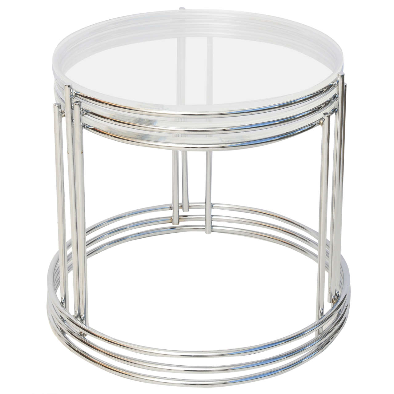 This set of three polished chrome and lucite nesting tables are very much in the style of Saporiti, Italia and date the the 1970s.

The three tables can be arranged when stacked to have variations on how the rods align or don't (see images).

Note: 