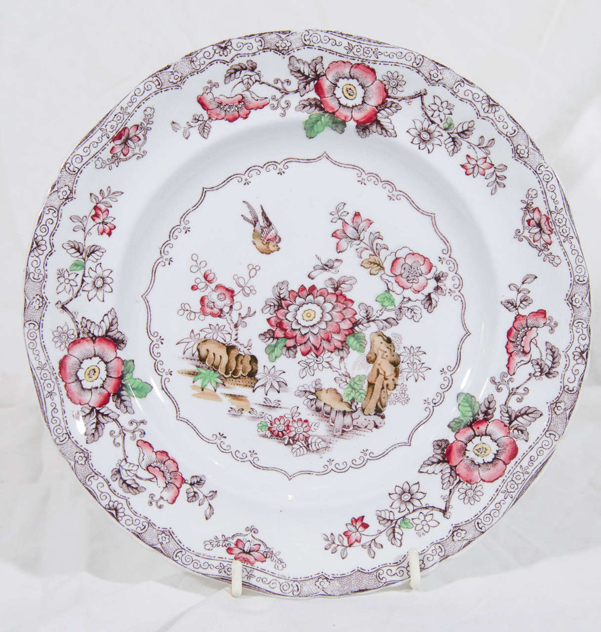 We are pleased to offer this fine, large, Victorian dessert service made in Staffordshire. 
Each dish shows a  songbird in flight above pink flowers. 
The service is in excellent condition. It must have been saved for only special occasions. 
It is