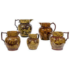 Collection of Scott Brothers or Southwick Pottery Pitchers
