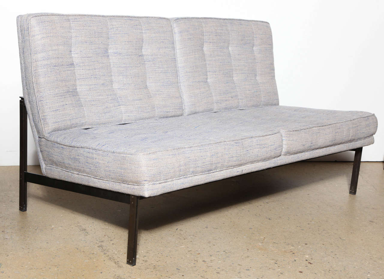 Florence Knoll for Knoll International Parallel Bar Systems Two Seat Settee with Cato Fabric. Featuring a patinated deep Bronze frame with neutral tufted  Blue, Gray and Off-White woven Cato fabric. Original. Modern. Rarity. Signed.