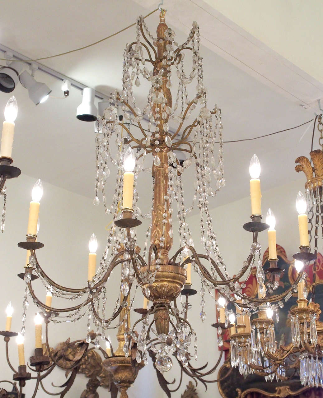 A pair of Italian Genovese giltwood and gilt iron with crystal dressing 