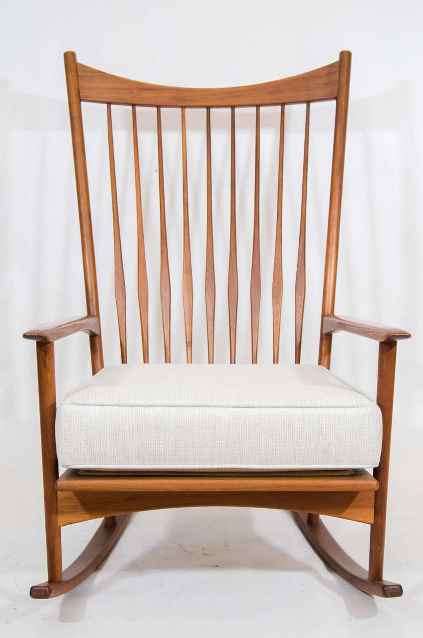 Handsome danish teak rocking chair by Hans Olsen. Beautifully detailed. Please contact for location.