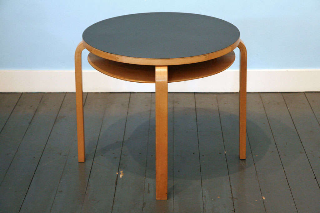 great original sidetable in with black top. with diameter 63 cm. Production 50's
(See as well for matching Hallwaychair).