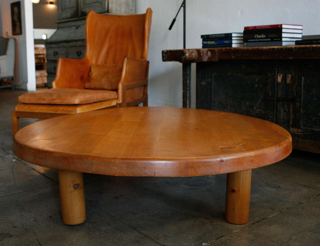 a large low charlotte perriand coffee table made of white pine.