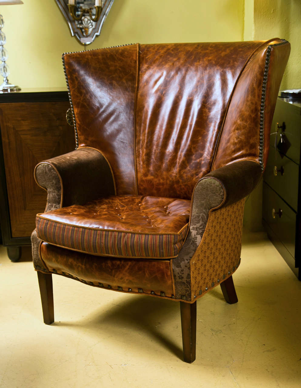 American A Jeff Zimmerman Wingback Chair and Matching Ottoman
