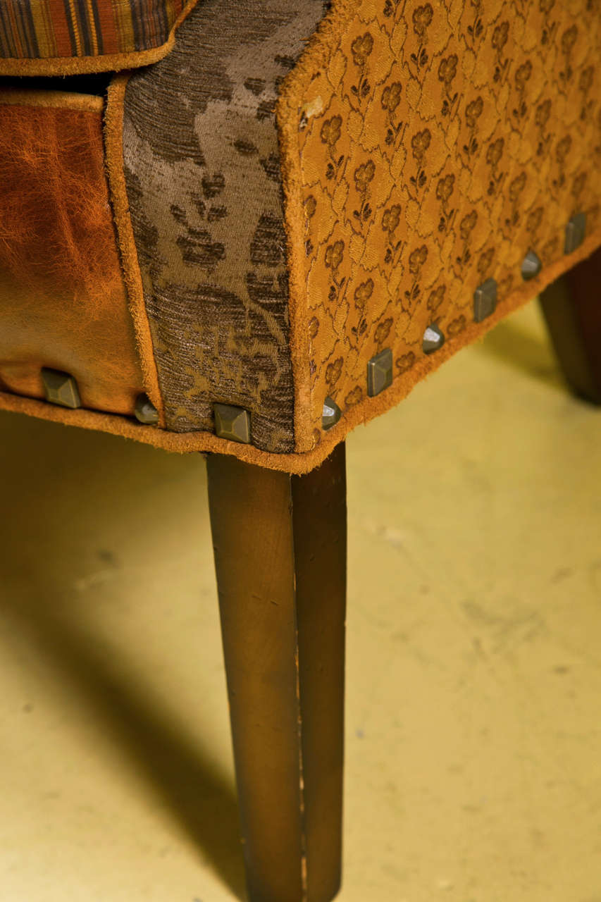 Late 20th Century A Jeff Zimmerman Wingback Chair and Matching Ottoman