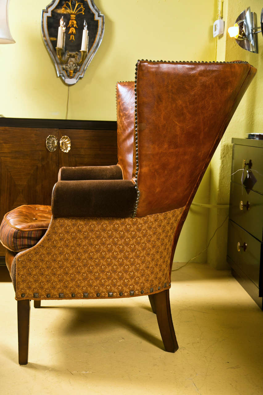 A Jeff Zimmerman Wingback Chair and Matching Ottoman 1