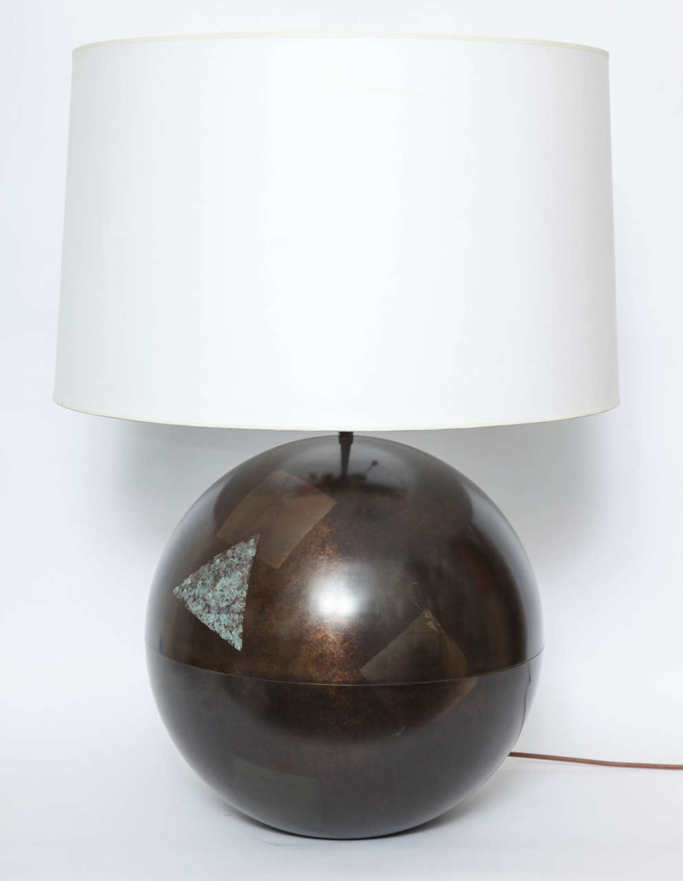 A Monumental patinated brass Table Lamp with Cubist Design by Karl Springer