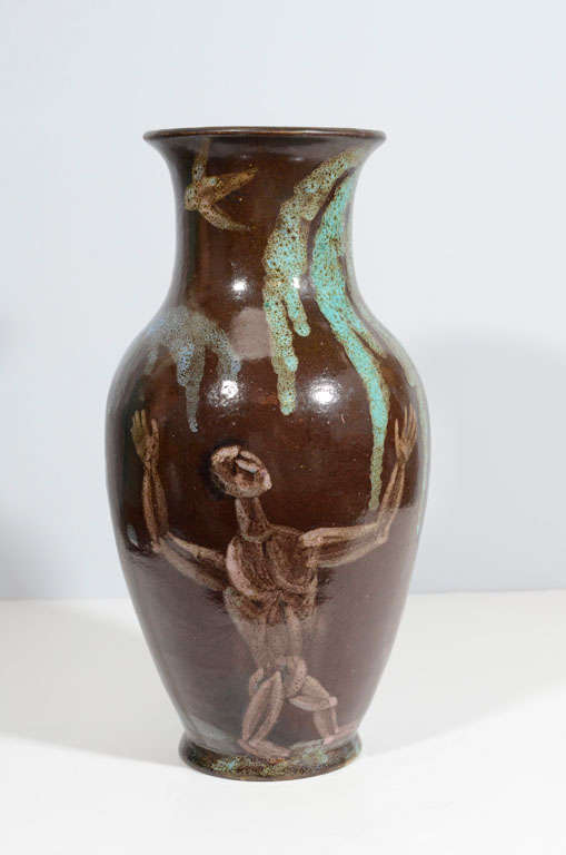 Brilliant, expressive art pottery vase by Istvan Gador, a member of the Wiener Werkstatte who is often credited as the father of modern Hungarian ceramics. Drilled and fitted for lamp base; original brass fittings included as shown. Signed 