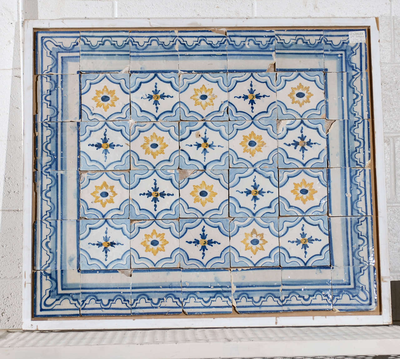 18th Century Portugese Tiles in Blue and Yellow, Circa 1780
Ceramic tile making is an ancient art form from Portugal.  This wonderful set of tiles, made for a special place in an old villa, has kept the beautiful colors of blue and yellow.  The