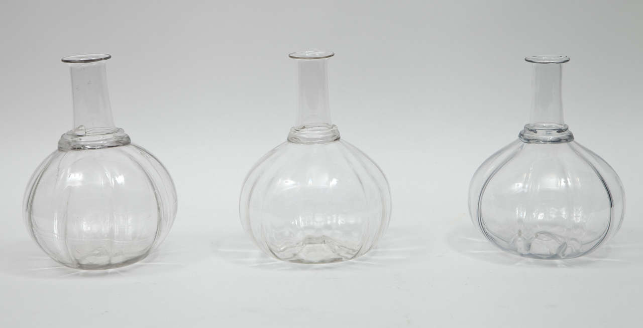 Swedish blown clear glass melon form carafes, 19th century. Originally for water but make very nice wine carafes.