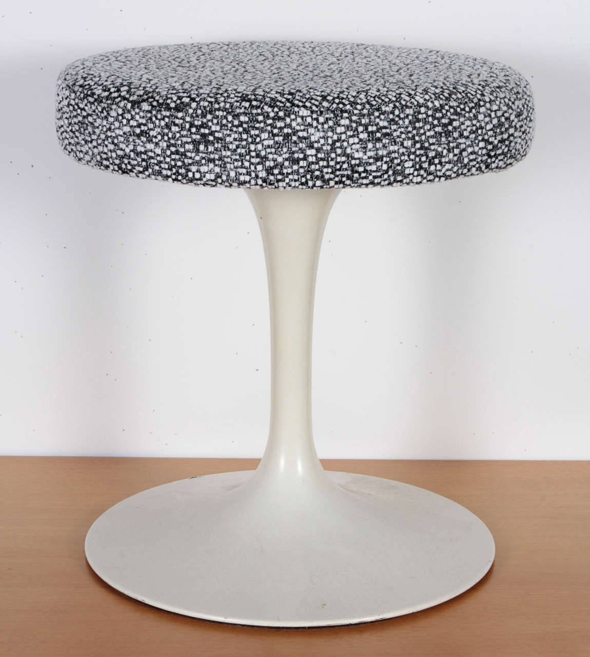 Eero Saarinen swivel tulip stools, Mfg. Knoll, 1960′s
Newly upholstered.  Roger Sterling from Mad Men uses these tulip stools in his office in the current season.