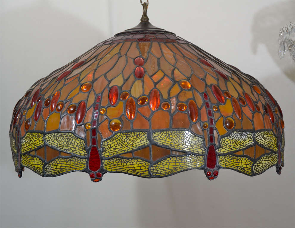 Lillian Nasseau Design Drop Head Dragon Fly Hanging Art Glass Fixture.  I do not find a Tiffany Signature however, I purchased it in an inventory from an upstate NY Warehouse that was closed in the 1920s. It was missing the top cap and wiring which