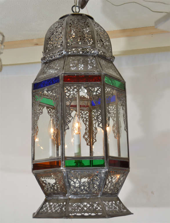 Hand made, pierced tin, Moroccan Lantern, housing four 60 watt, candles