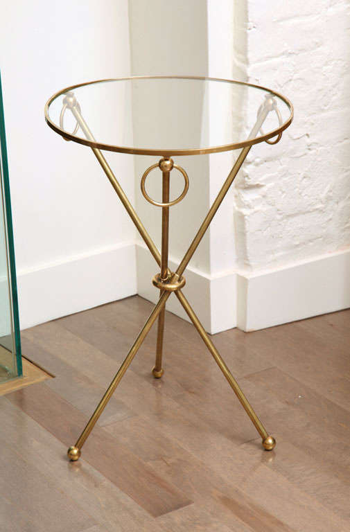 Mid-20th Century Brass ring drink table with glass top and tri-pod legs, c. 1950