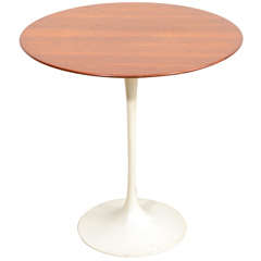 An Eero Saarinen for Knoll Round Rosewood Pedestal Table.