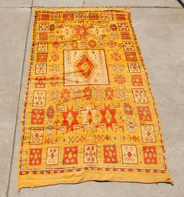 1960s authentic Moroccan vintage tribal organic wo rug, earth orange tone cors, Handwoven by the Berber women of the Middle Atlas of Morocco. Geometrical abstract designs, great clector pile ethnic carpet, cod be used as a runner.African Moroccan