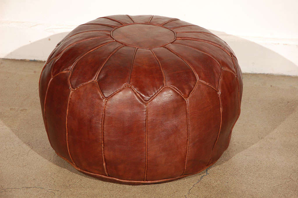 Large Moroccan leather pouf, hand-crafted dark brown camel leather.
Filled with foam.
Multiple available.

Mosaik provides global Antiques, Art Deco, Moorish Style, Spanish, African, Islamic Art, Arabian, Middle Eastern, Egyptian, Syrian Style,