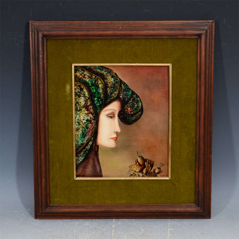 A vintage surrealist oil painting of a female in profile. The piece is framed in wood and green velvet and signed in the lower right corner by Mexican artist Fernand.