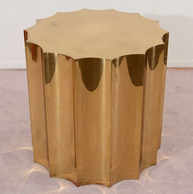 A Great Abstract Pair of Modern Design Polished Brass Tables or Pedestals with Scallop Design Form,that are can be used in many Interiors.Incredibly Modern and High End,would add Elegance and Clout to any Room.Clean and Sleek Design that Karl