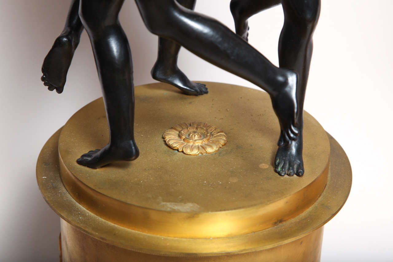 Pair of French neoclassical patinated and gilt bronze figural centerpieces 5