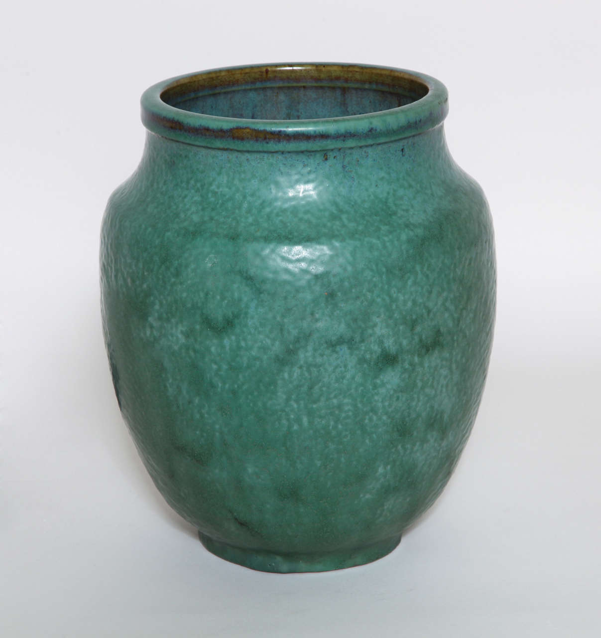 Stoneware vase with mottled green glaze by Emile Decoeur (1876-1953).
Signed: E DECOEUR 5 incised on base

Other Emile Decoeur vases available.
