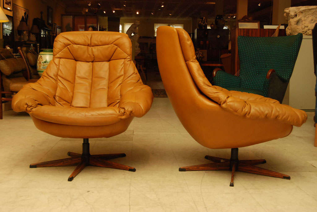 Danish Pair of Leather Swivel Chairs by W Klein