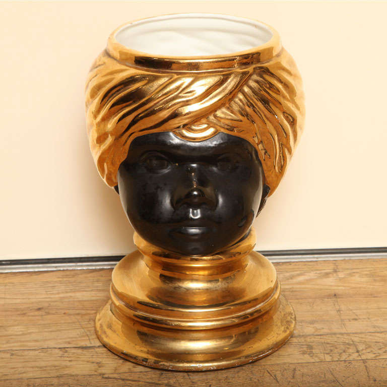 An Italian Glazed Ceramic Vase in the Manner of Piero Fornasetti